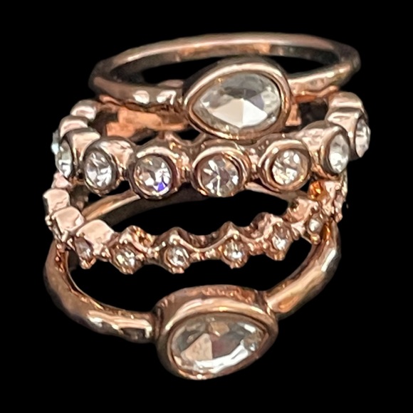 Jewelry - Stackable rose gold tone rings size 7 Can wear 1 or all 4 together! Super cute.